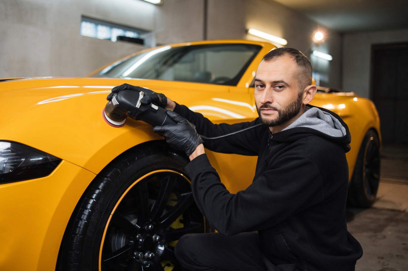 Professional Car Polishing in Dubai restoring vehicle paint shine